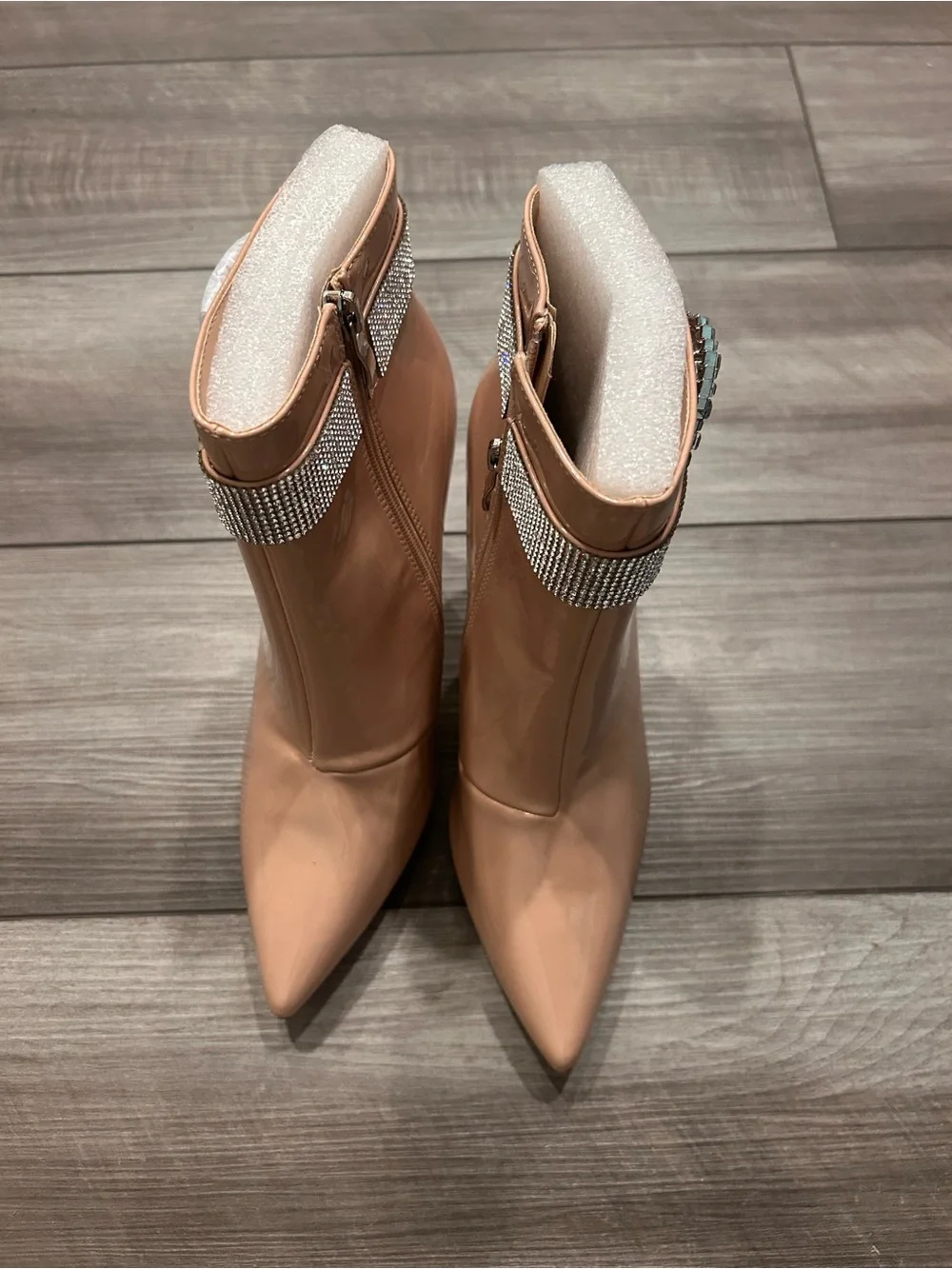 Nude Patent Rhinestone Buckle Ankle Bootie